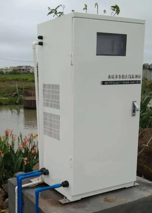 Complete riverside water-quality monitoring cabinet with a display window, sampling pipes, and mounting base
